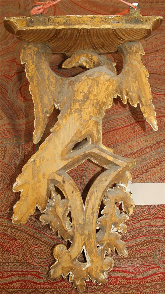 A pair of 19th century carved giltwood wall brackets, 17in.